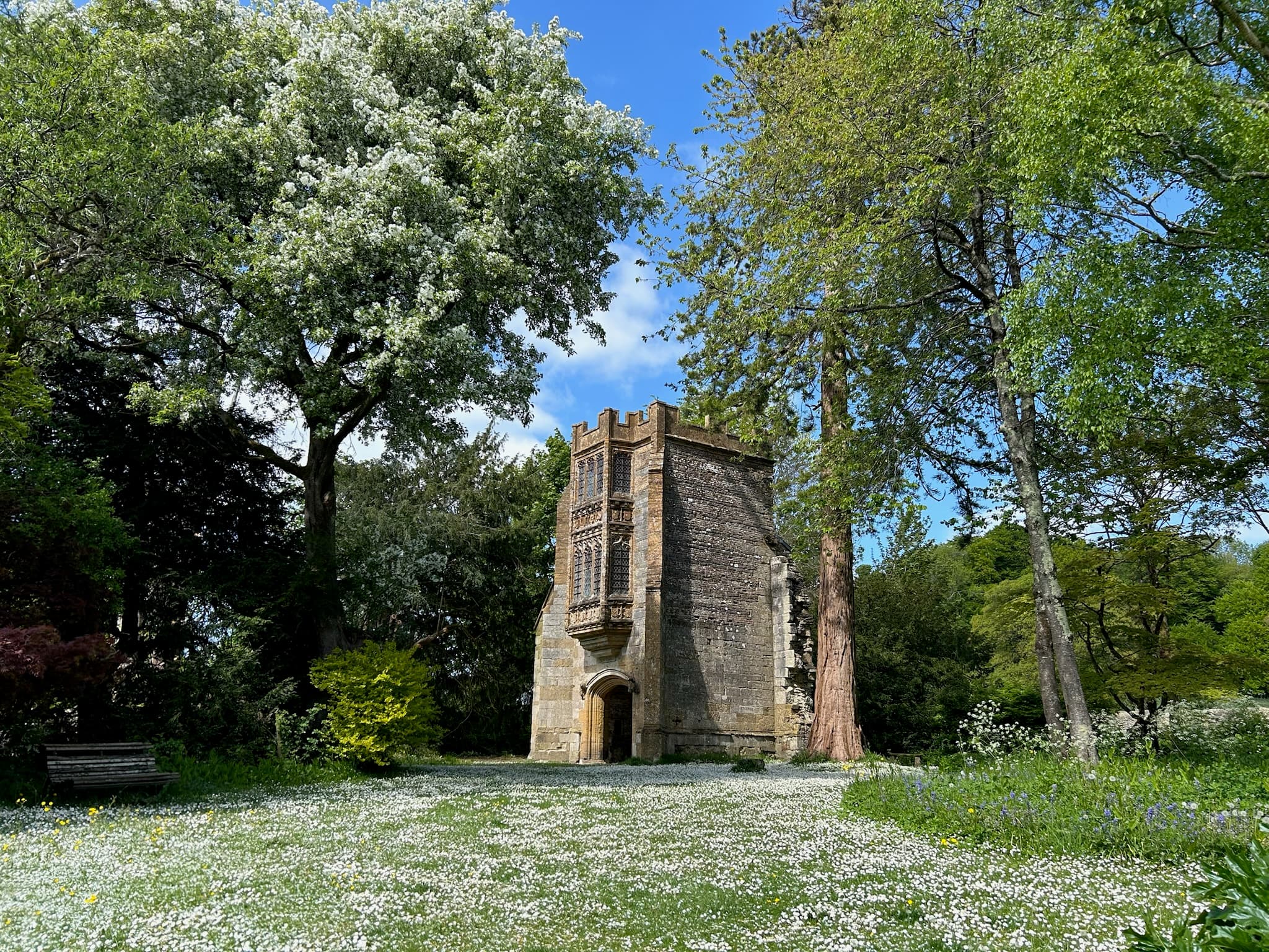 The Abbot's Porch and grounds at Cerne Abbey, a Tudor gatehouse in Dorset
